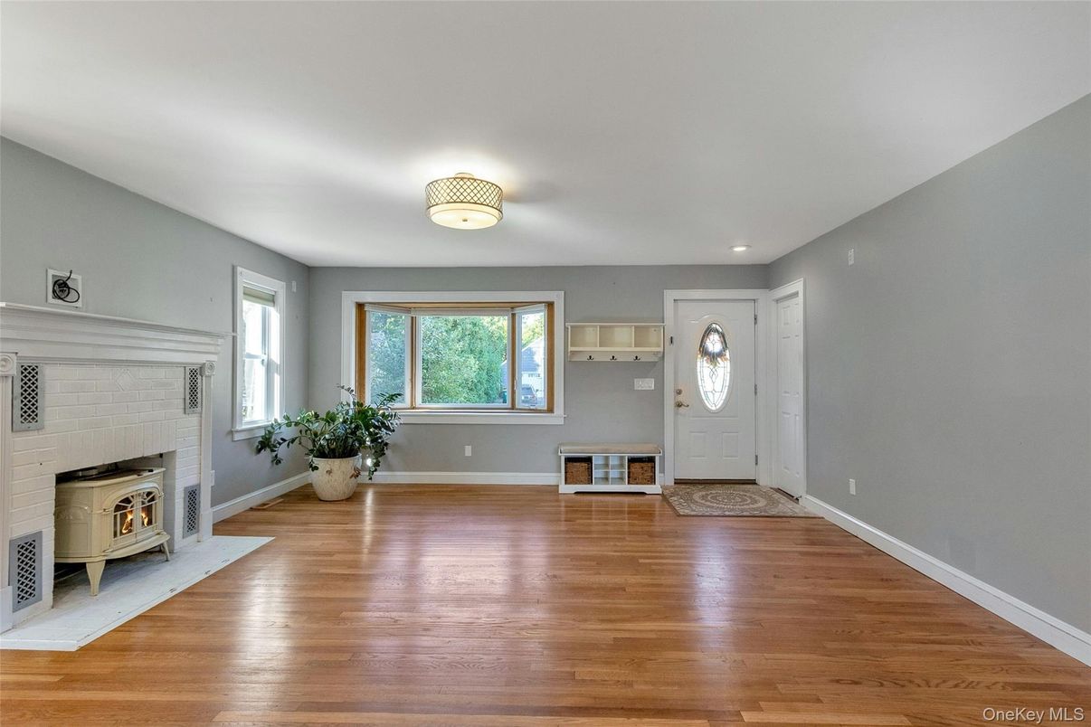 Empty room, Fireplace, Interior, Recessed Lighting, Wood Texture Flooring