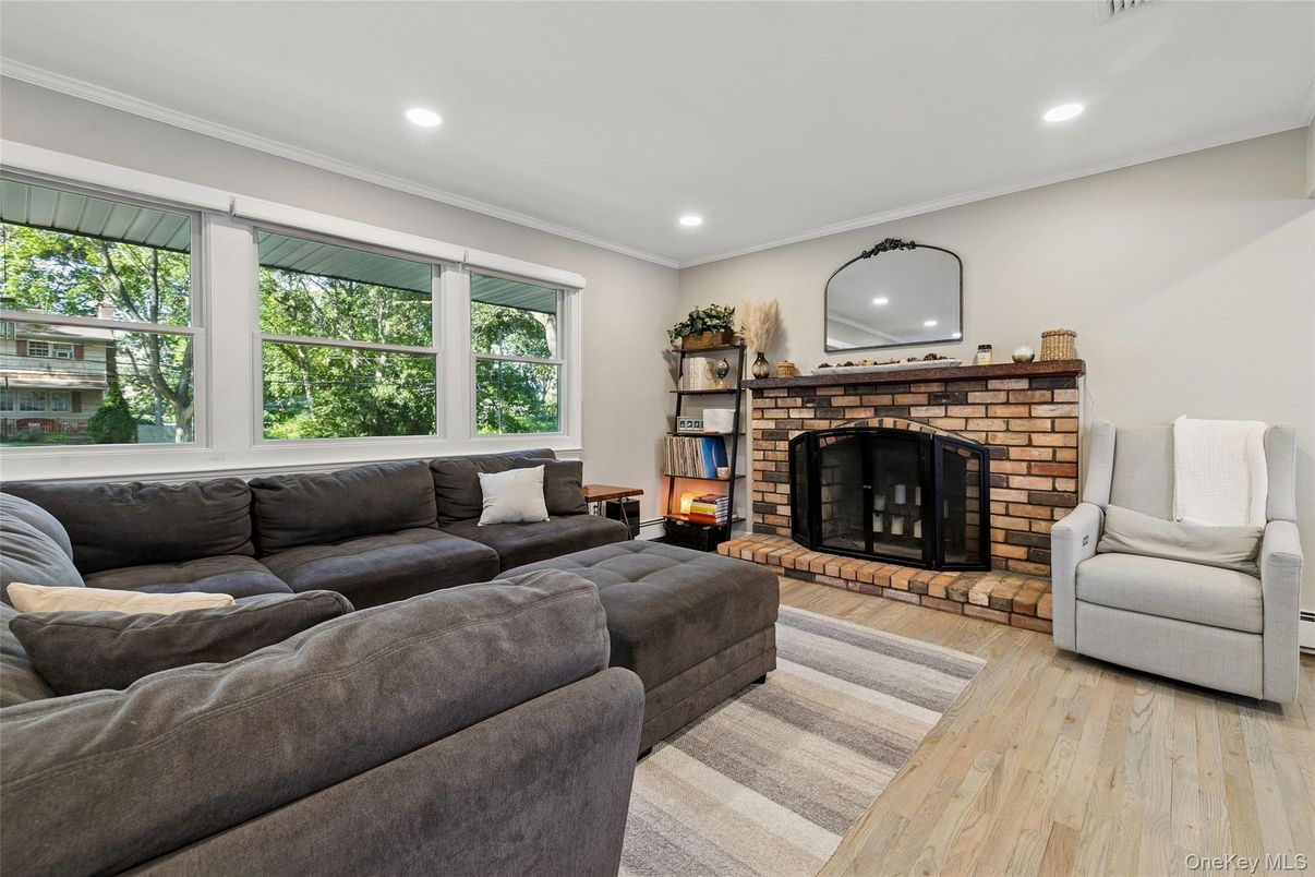 Fireplace, Interior, Living room, Recessed Lighting, Wood Texture Flooring