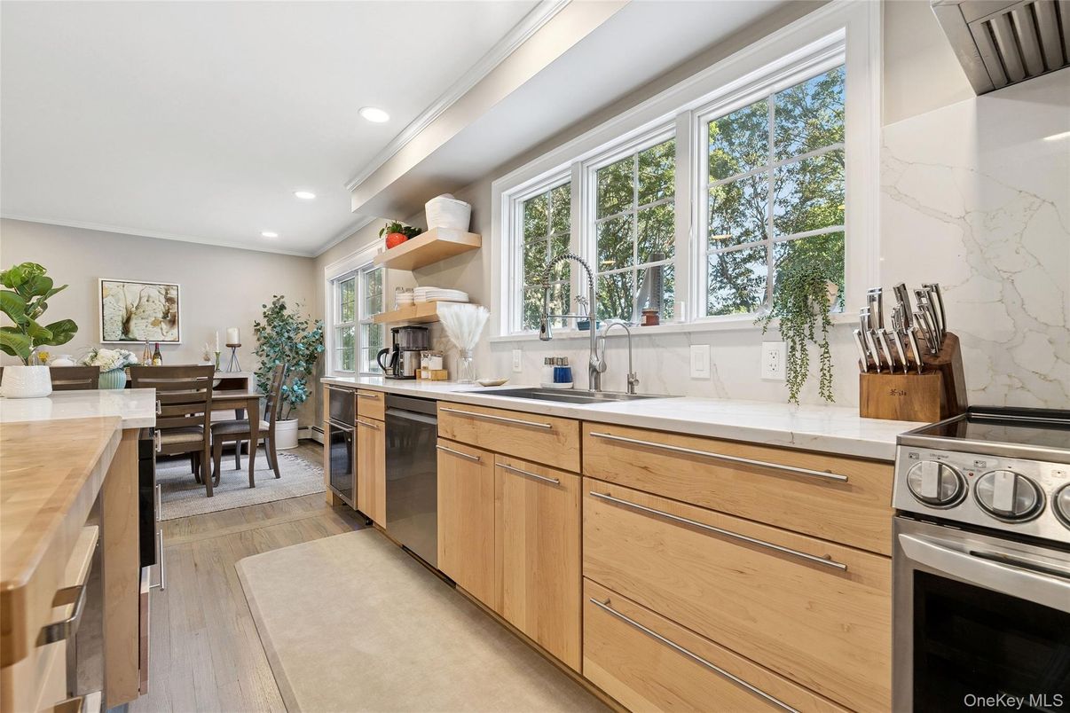 Dining room, Interior, Kitchen, Recessed Lighting, Stainless Steel Appliances, Wood Texture Flooring