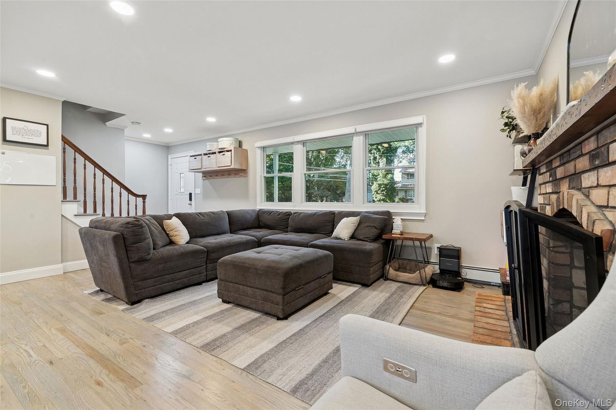 Fireplace, Interior, Living room, Recessed Lighting, Wood Texture Flooring