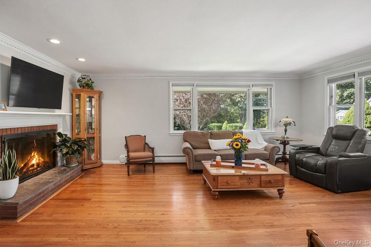Fireplace, Interior, Living room, Recessed Lighting, Wood Texture Flooring