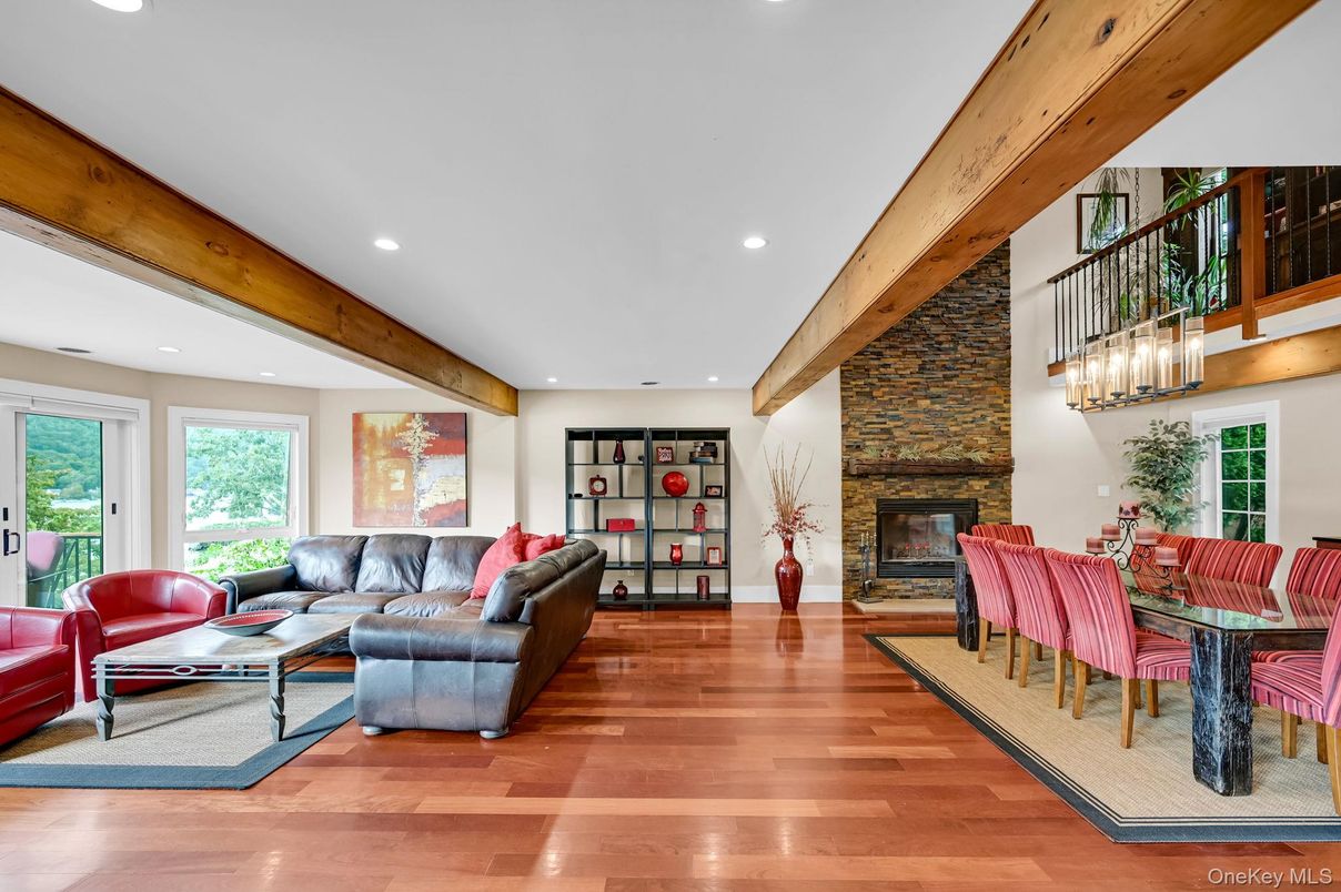 Dining room, Fireplace, Interior, Living room, Recessed Lighting, Stone Walls, Wooden Beams, Wood Texture Flooring