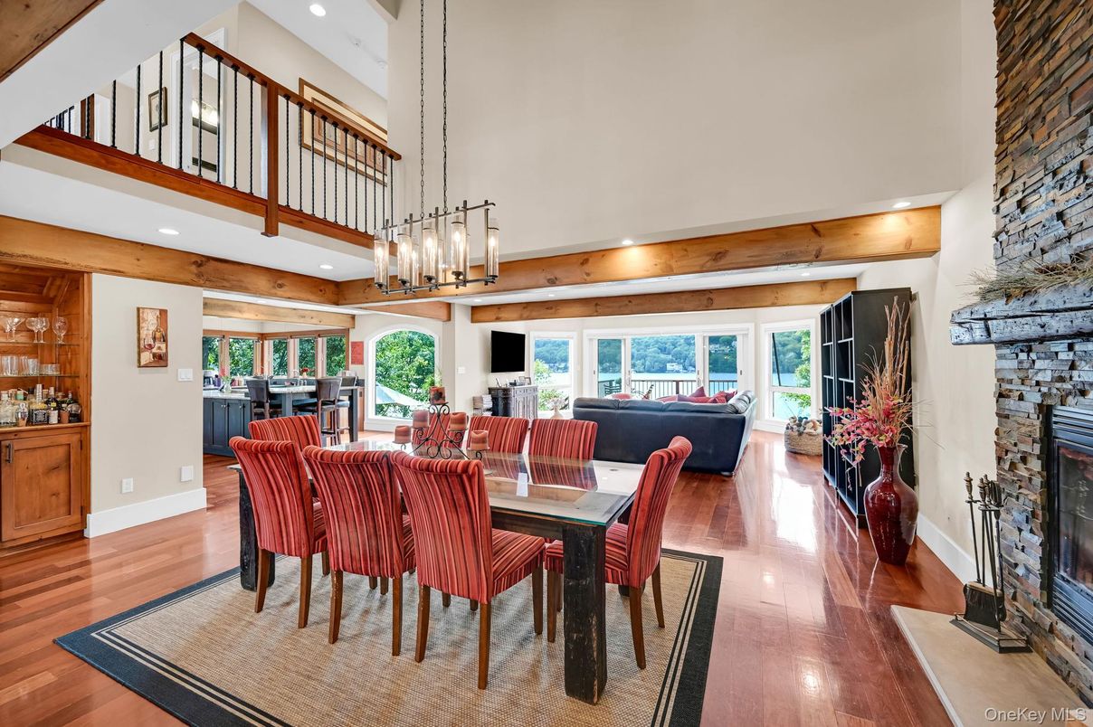 Dining room, Fireplace, Interior, Living room, Pendant Lights, Recessed Lighting, Wooden Beams, Wood Texture Flooring