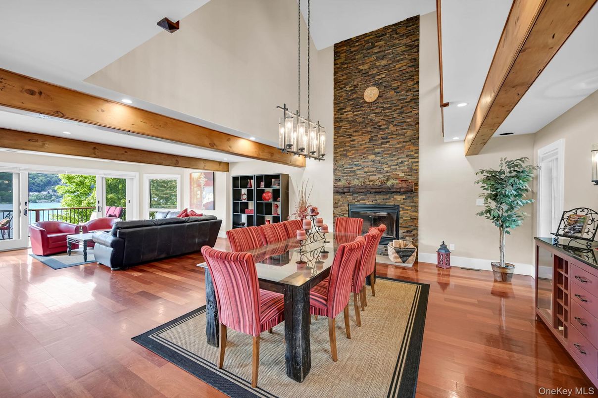 Dining room, Fireplace, Interior, Living room, Pendant Lights, Recessed Lighting, Stone Walls, Wooden Beams, Wood Texture Flooring