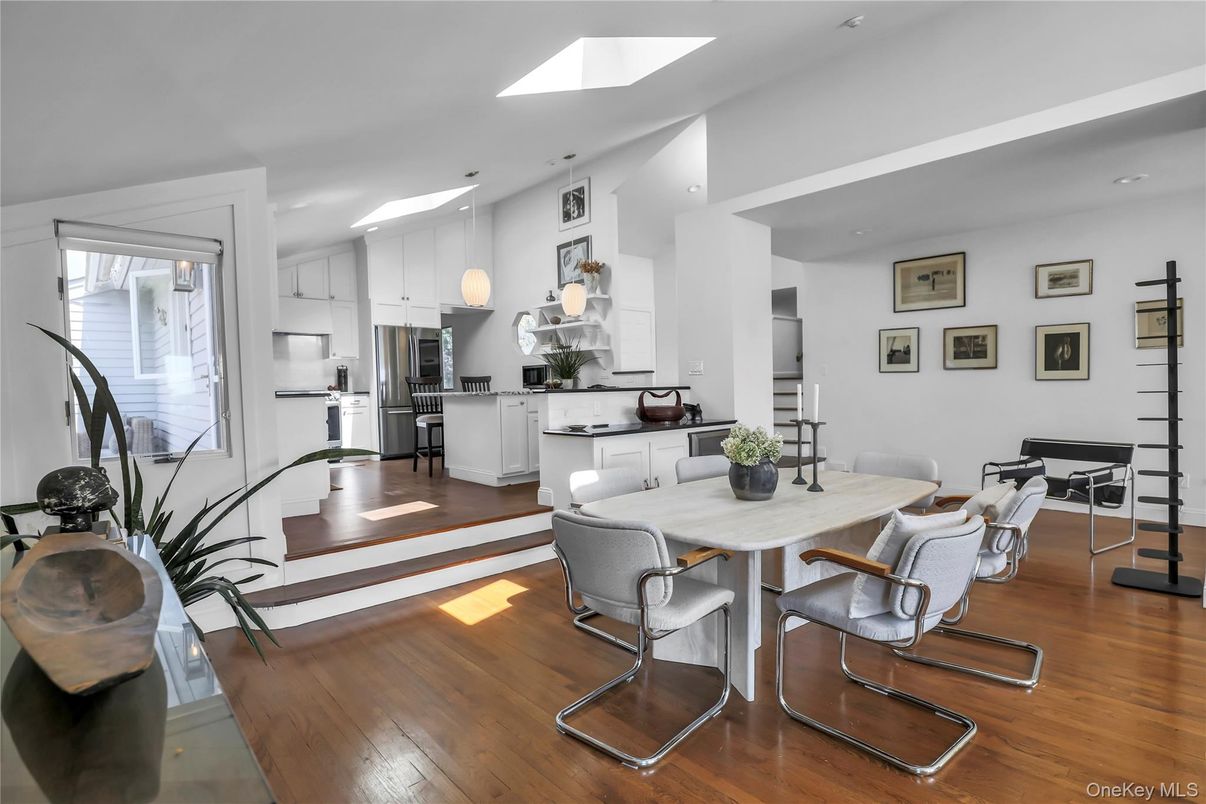 Dining room, Interior, Kitchen, Pendant Lights, Recessed Lighting, Stainless Steel Appliances, Wood Texture Flooring