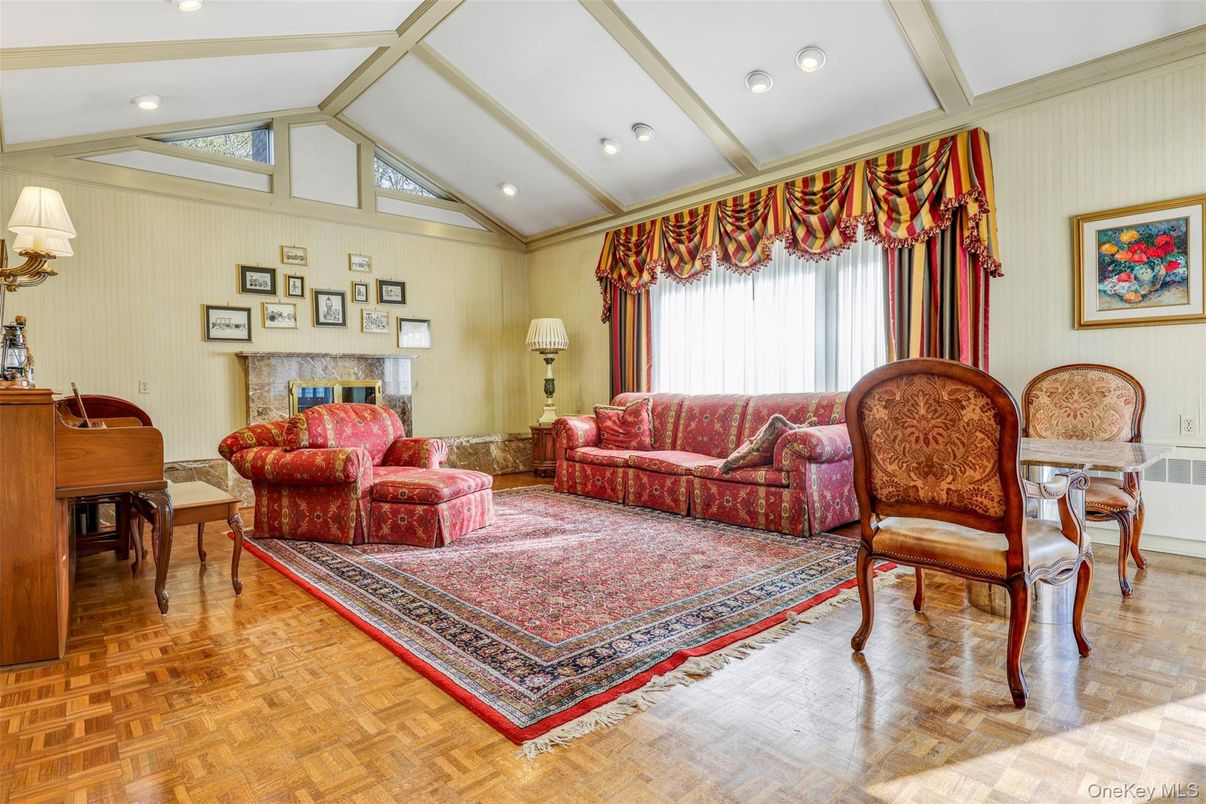 Dining room, Fireplace, Interior, Living room, Piano, Recessed Lighting, Wood Texture Flooring