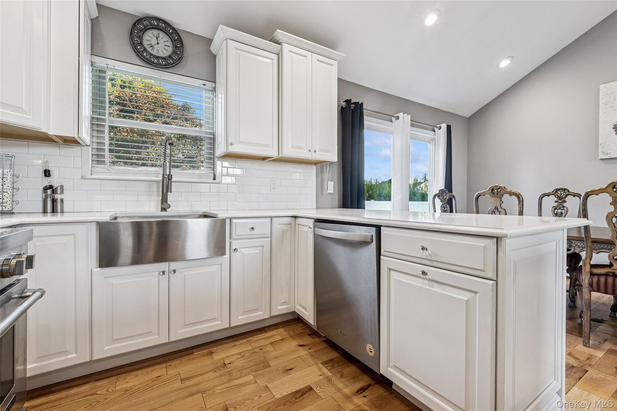 Dining room, Interior, Kitchen, Recessed Lighting, Stainless Steel Appliances, Wood Texture Flooring