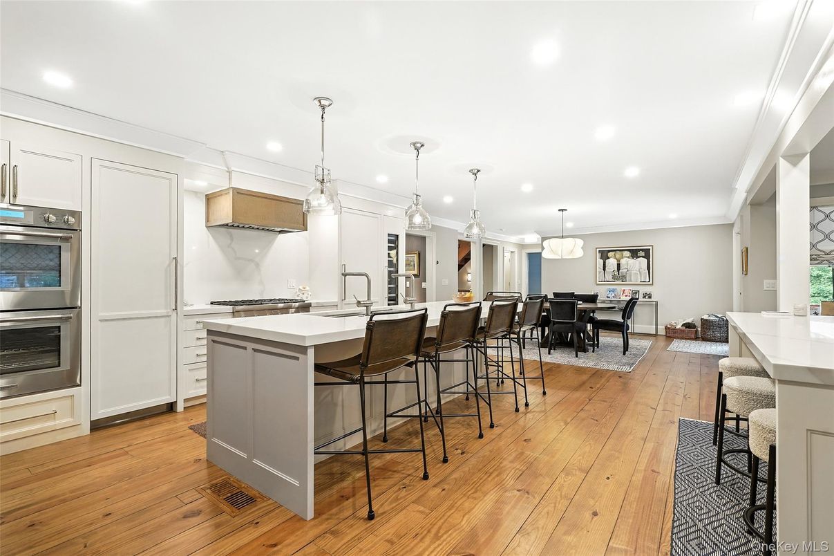 Dining room, Interior, Kitchen, Pendant Lights, Recessed Lighting, Stainless Steel Appliances, Wood Texture Flooring