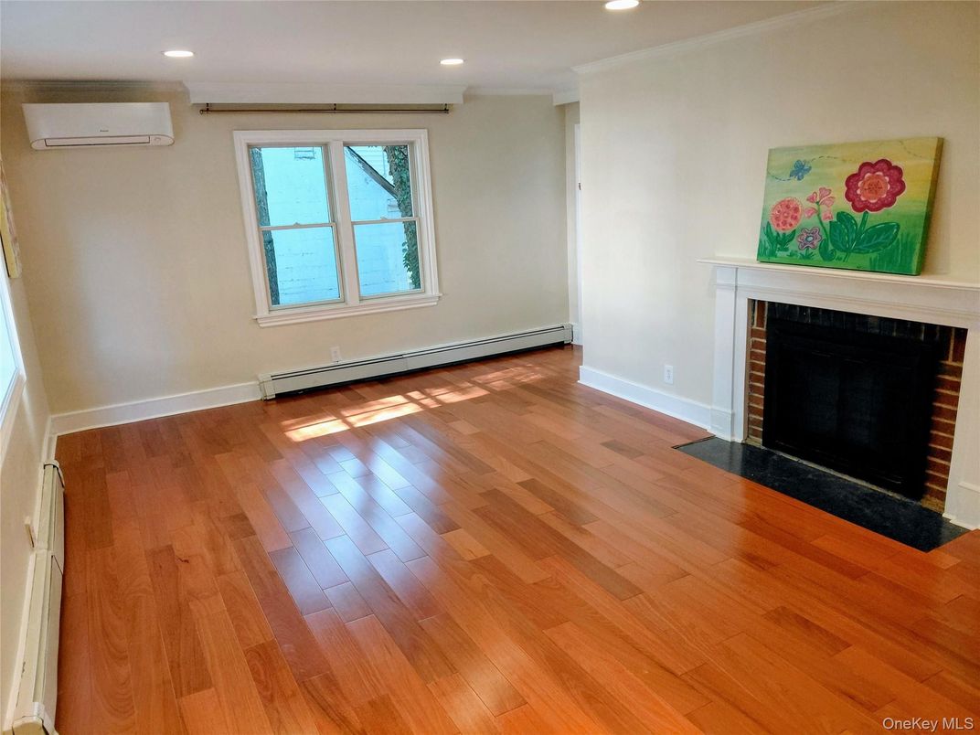 Empty room, Fireplace, Interior, Recessed Lighting, Wood Texture Flooring