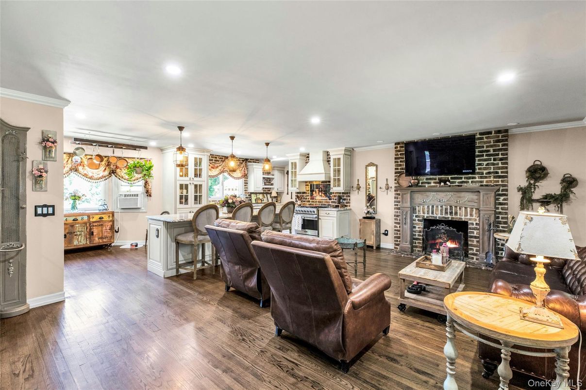 Fireplace, Interior, Kitchen, Living room, Pendant Lights, Recessed Lighting, Stone Walls, Wood Texture Flooring