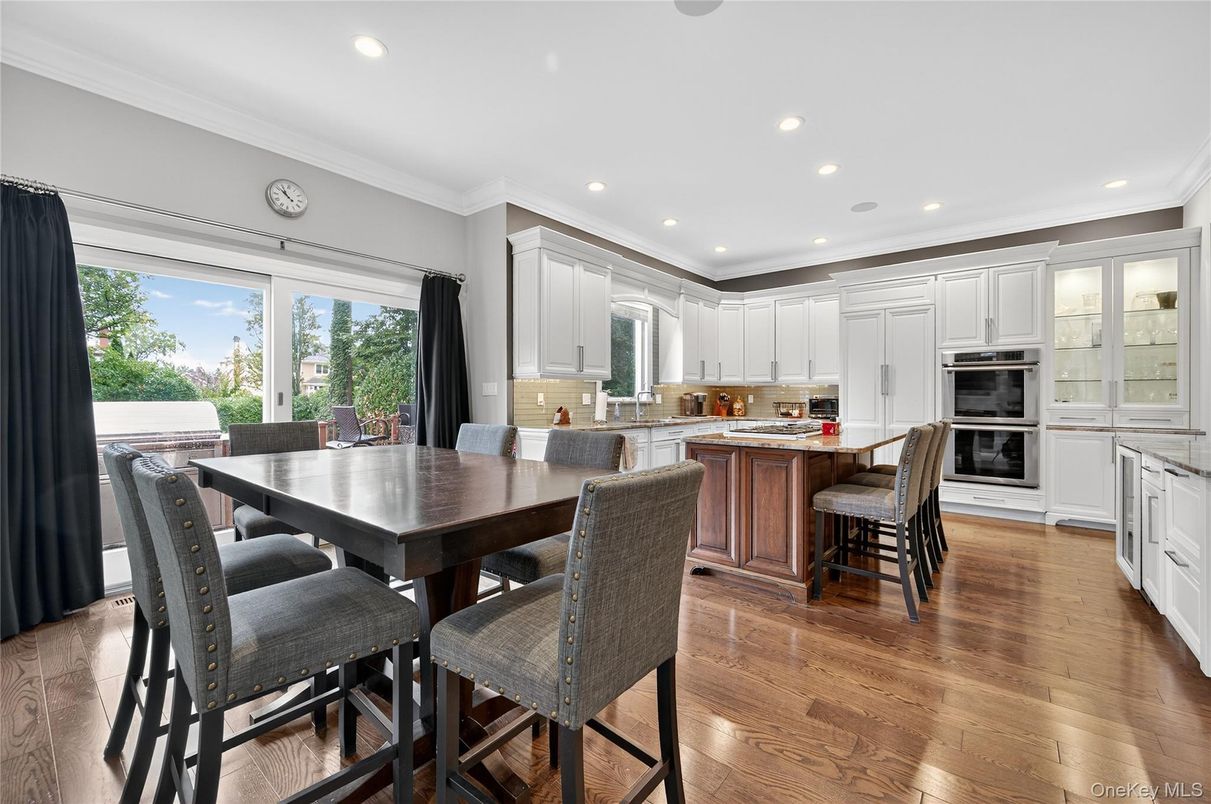 Dining room, Interior, Kitchen, Recessed Lighting, Stainless Steel Appliances, Wood Texture Flooring