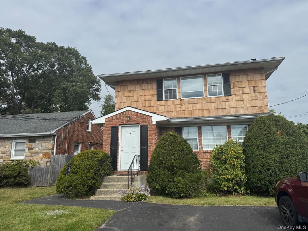 Exterior, Facade, Brick Facade, Split Level