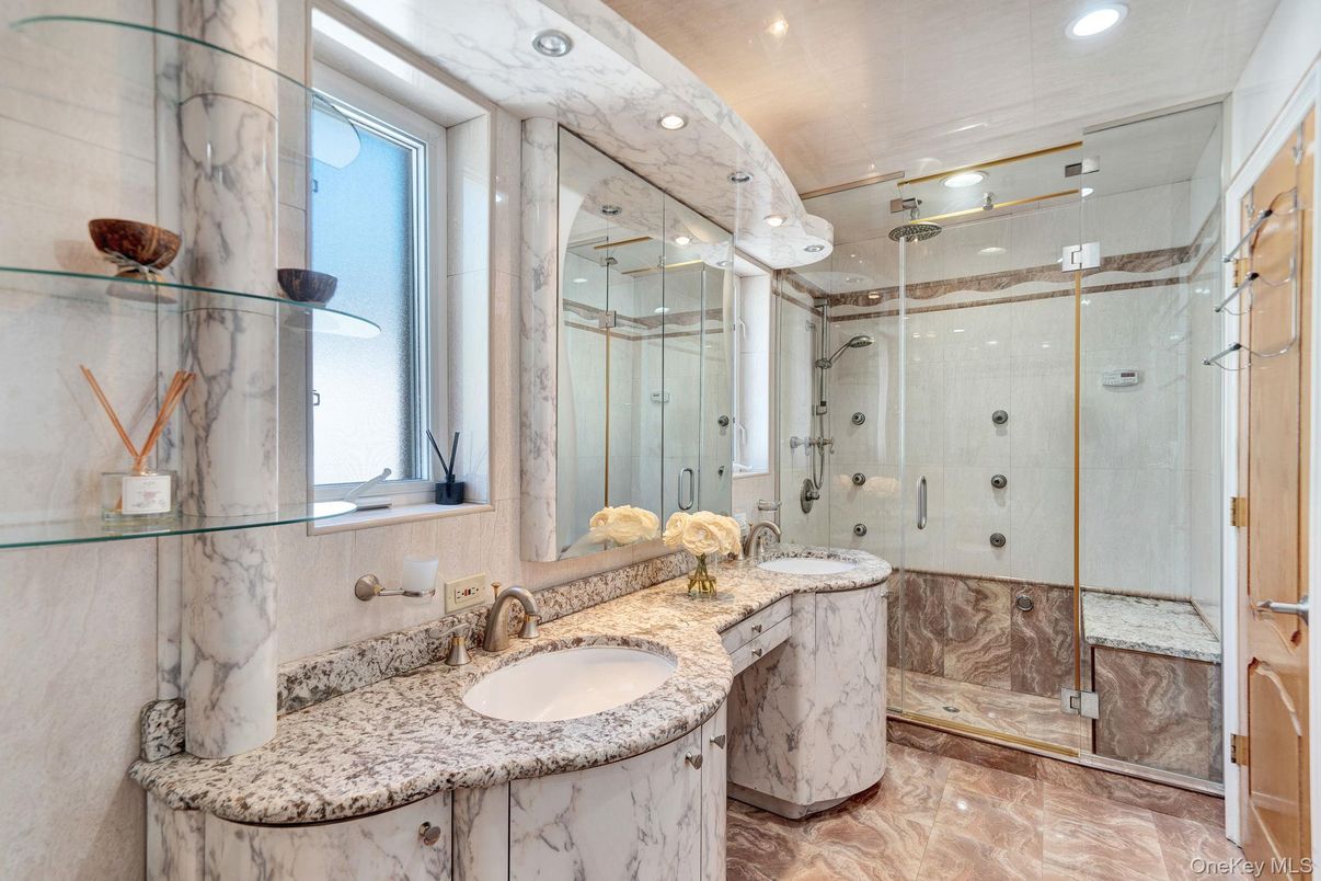 Bathroom, Dual Sink Vanities, Glass Shower, Interior, Marble Walls, Recessed Lighting