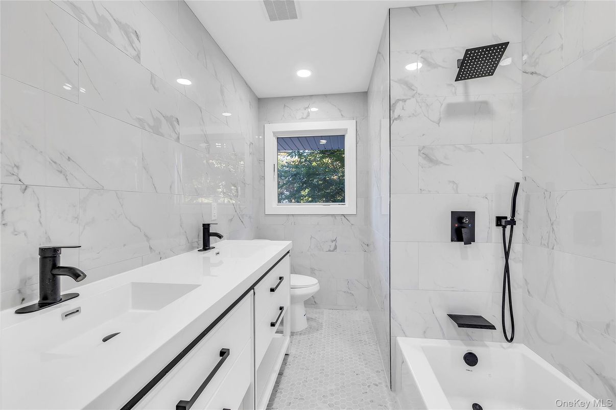 Bathroom, Dual Sink Vanities, Interior, Marble Walls, Recessed Lighting