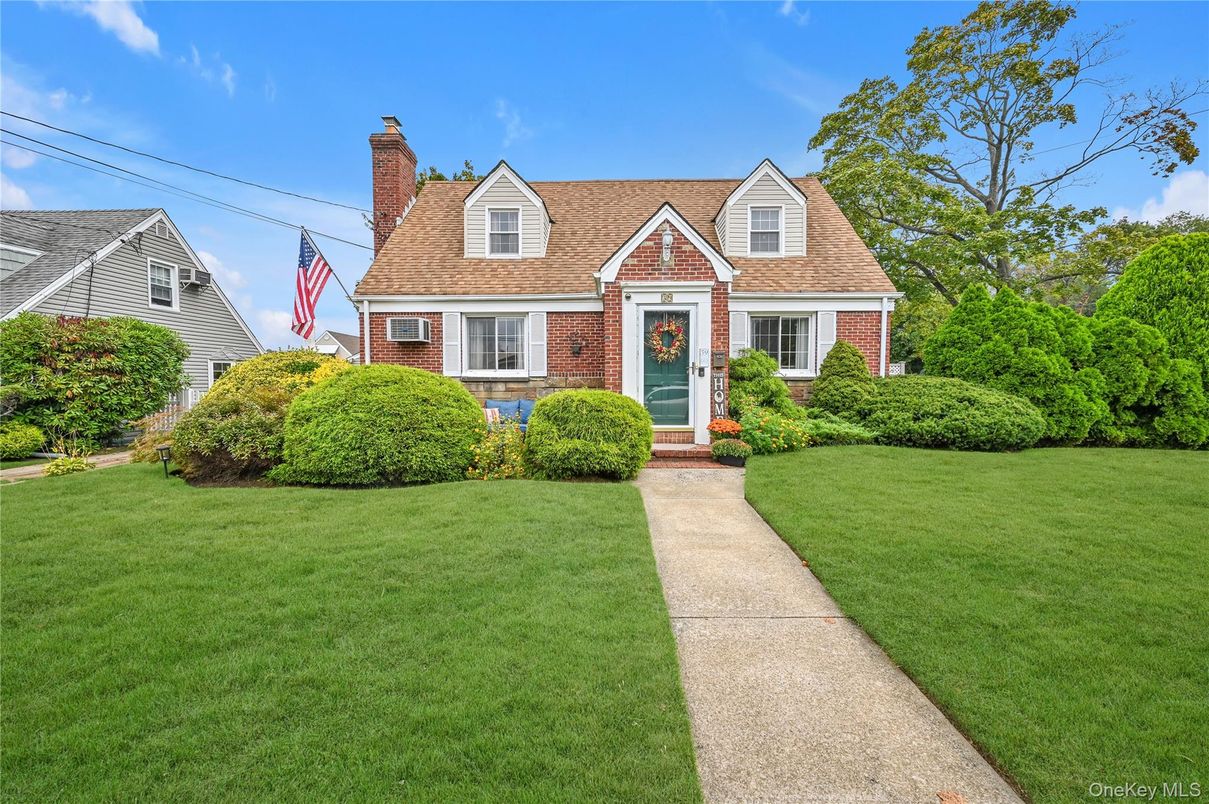 Exterior, Facade, Brick Facade, Cape Cod