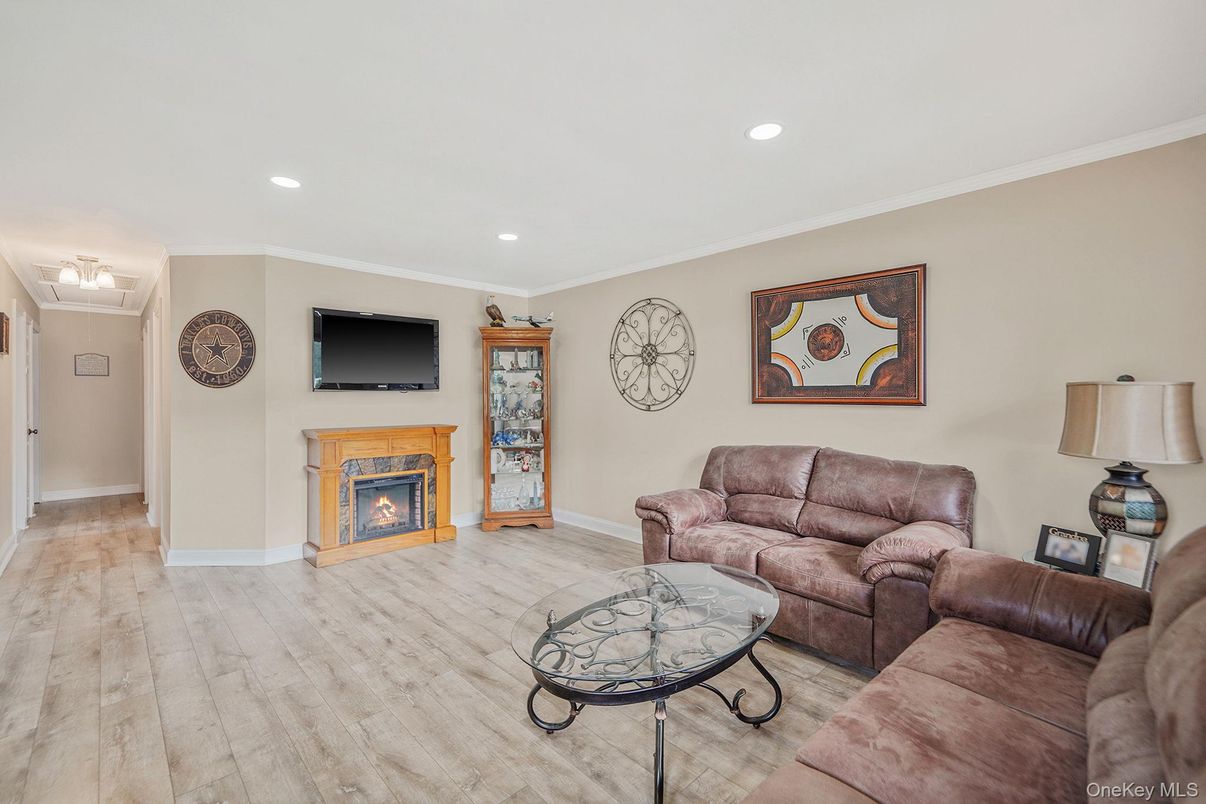 Fireplace, Interior, Living room, Recessed Lighting, Wood Texture Flooring