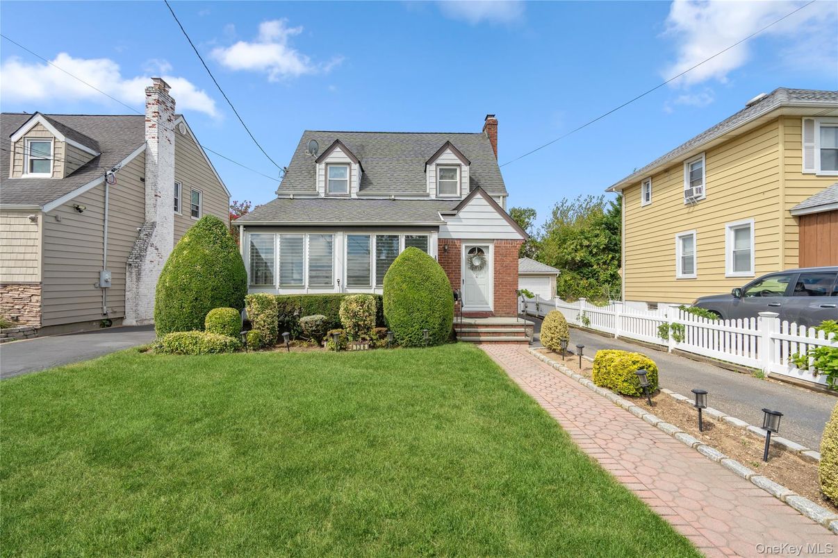Attached, Exterior, Facade, Brick Facade, Cape Cod