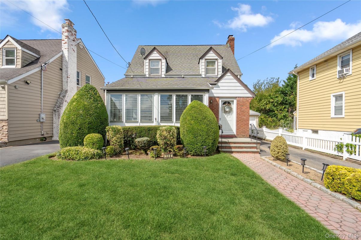 Exterior, Facade, Brick Facade, Cape Cod
