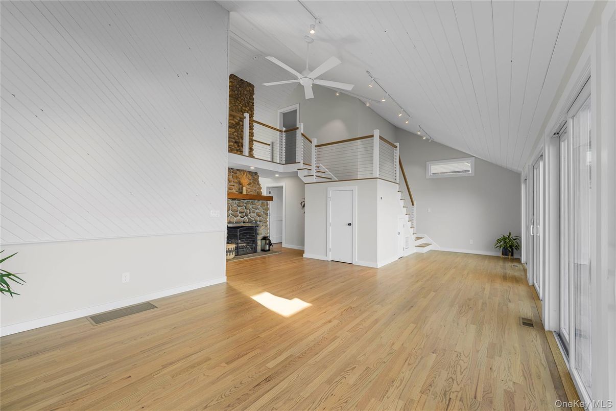 Empty room, Fireplace, Interior, Recessed Lighting, Wood Texture Flooring