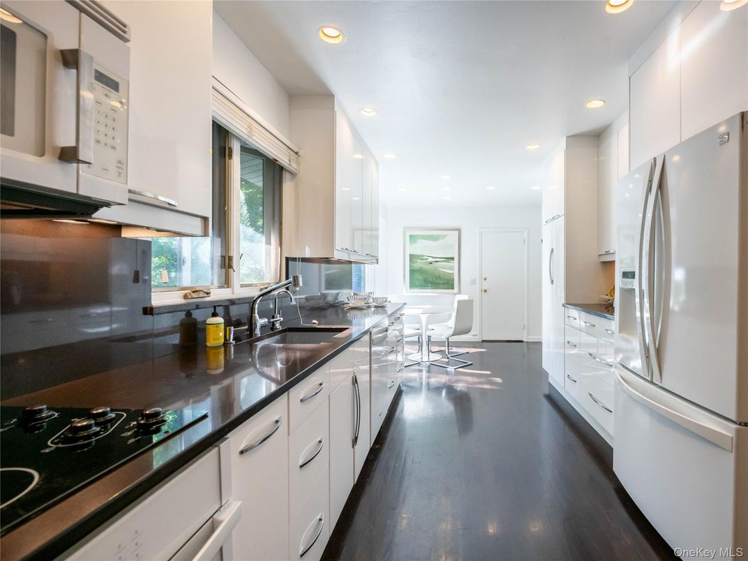 Dining room, Interior, Kitchen, Recessed Lighting, Stainless Steel Appliances, Wood Texture Flooring