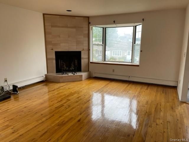 Empty room, Fireplace, Interior, Recessed Lighting, Wood Texture Flooring