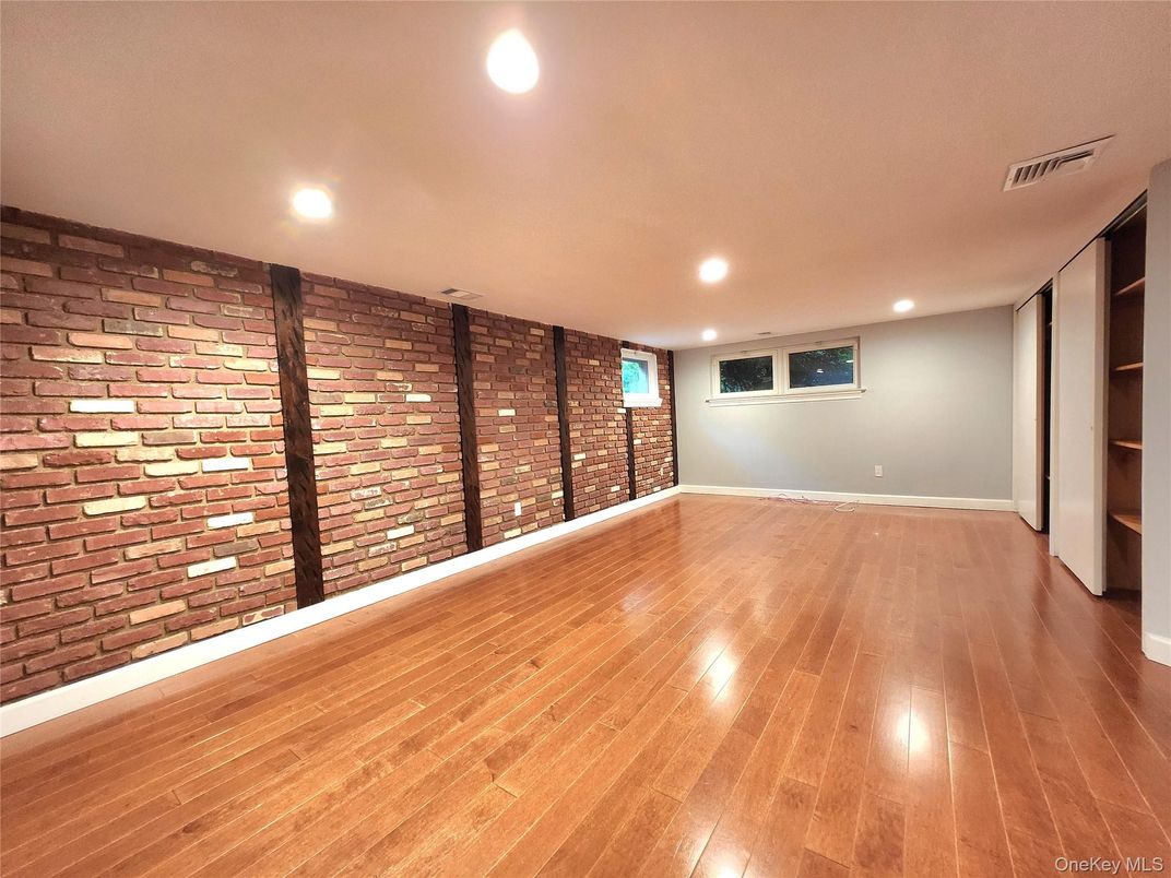 Empty room, Interior, Recessed Lighting, Stone Walls, Wood Texture Flooring