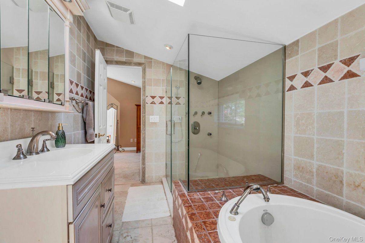 Bathroom, Dual Sink Vanities, Glass Shower, Interior, Recessed Lighting, Tile Countertops