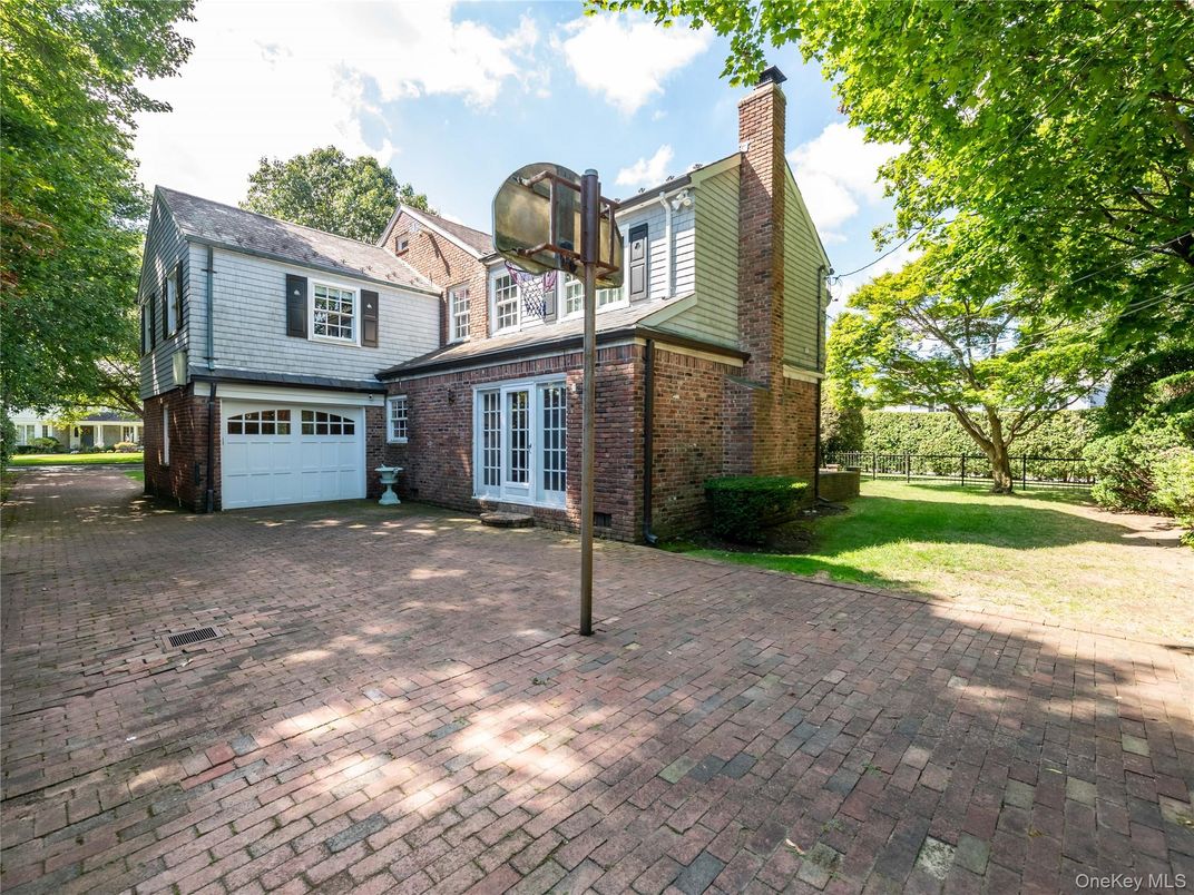Attached, Exterior, Facade, Brick Facade, Tudor Revival