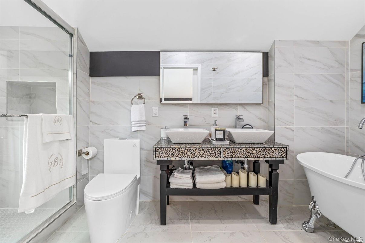 Bathroom, Dual Sink Vanities, Free Standing Baths, Interior, Marble, Marble Walls