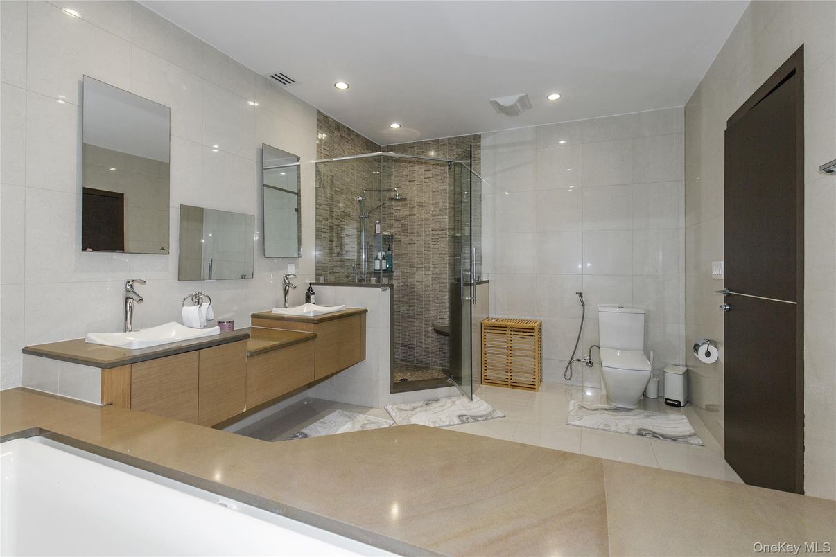 Bathroom, Dual Sink Vanities, Glass Shower, Interior, Marble, Recessed Lighting