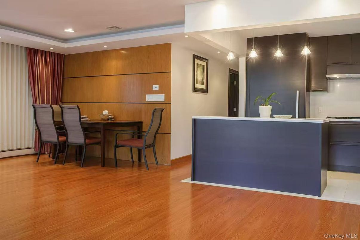 Dining room, Interior, Kitchen, Pendant Lights, Recessed Lighting, Stainless Steel Appliances, Wood Texture Flooring