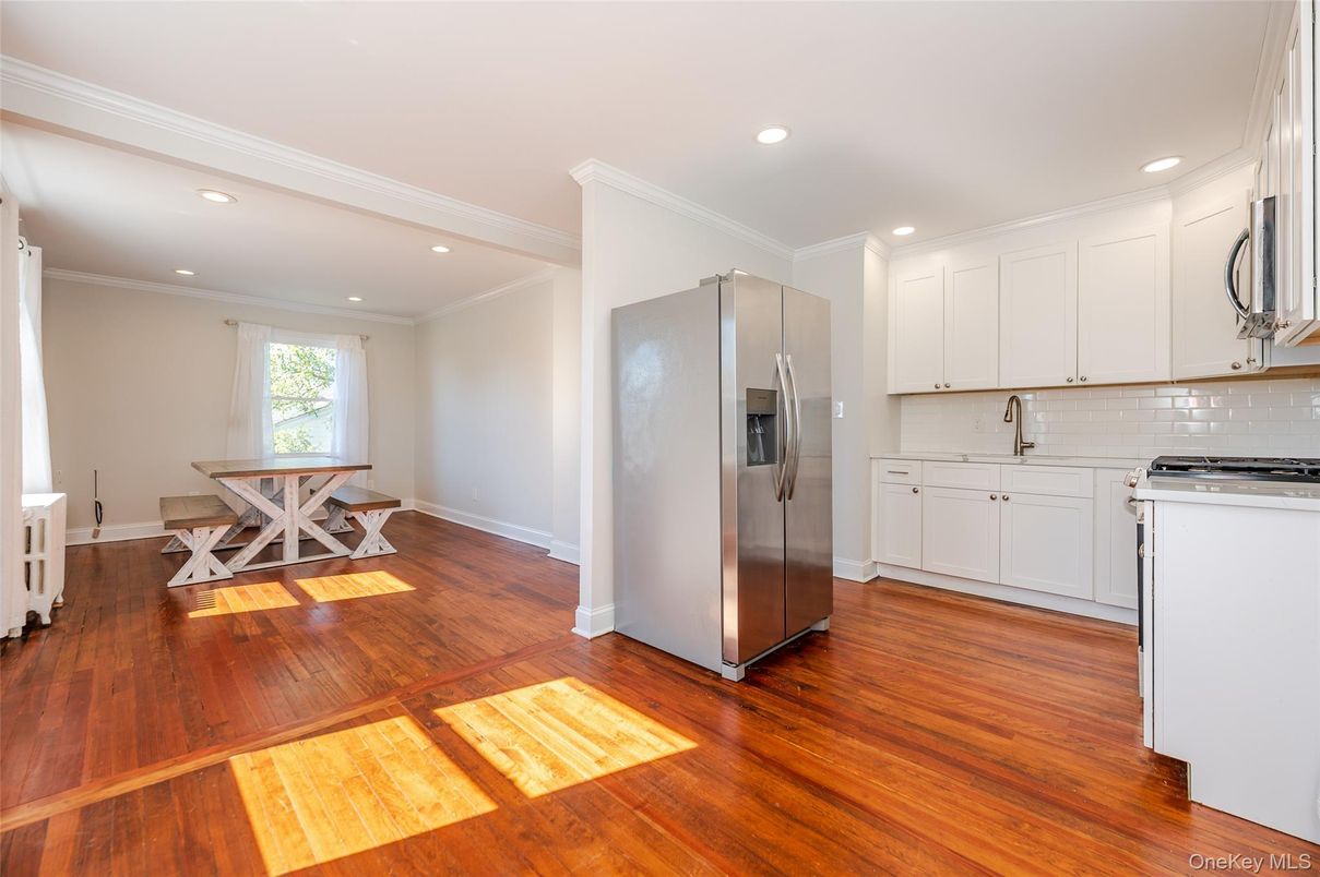 Dining room, Interior, Kitchen, Recessed Lighting, Stainless Steel Appliances, Wood Texture Flooring