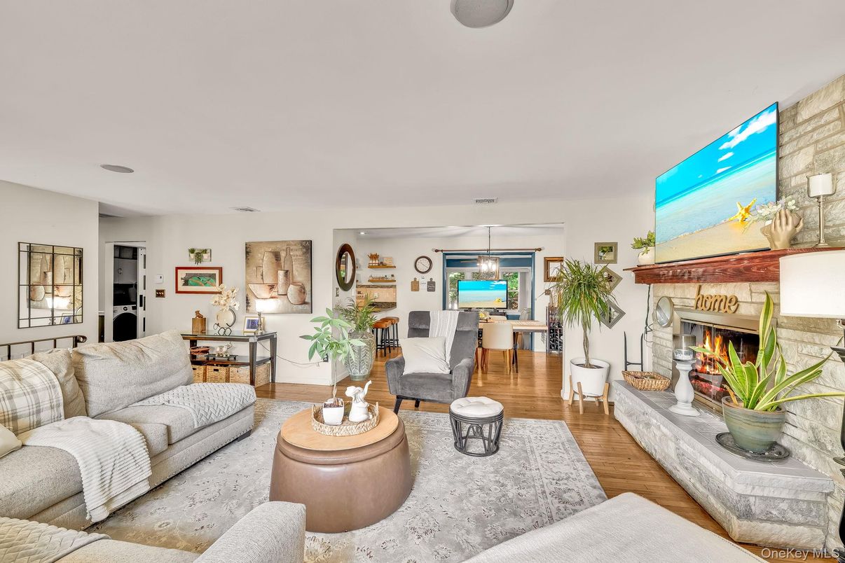 Dining room, Fireplace, Interior, Living room, Pendant Lights, Wood Texture Flooring
