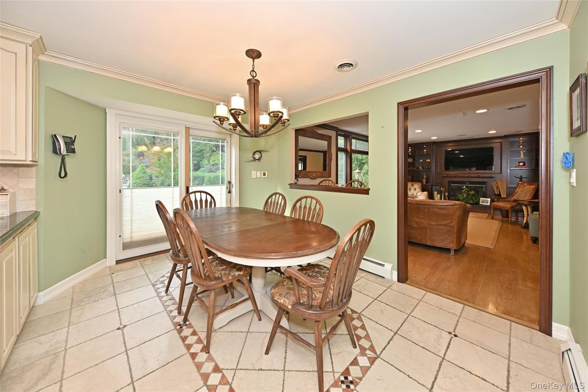 Chandelier, Dining room, Fireplace, Interior, Living room, Recessed Lighting, Wood Texture Flooring