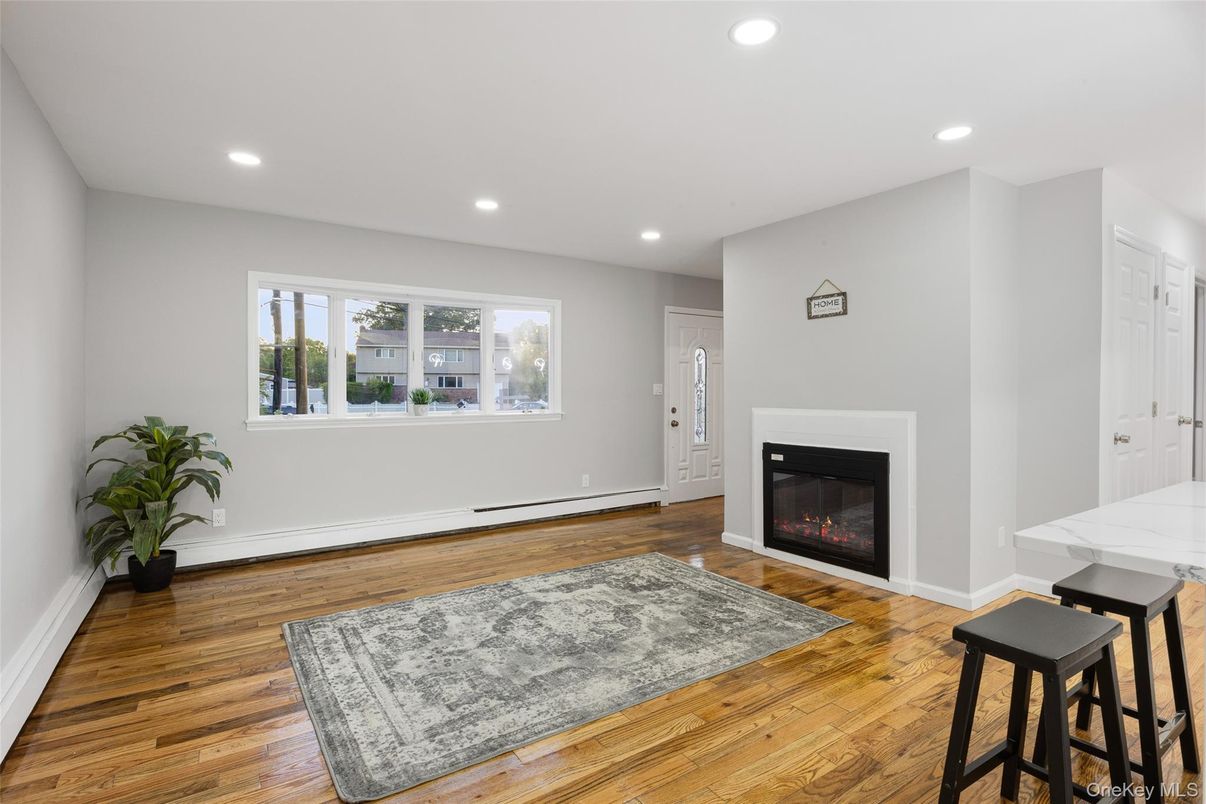 Empty room, Fireplace, Interior, Recessed Lighting, Wood Texture Flooring