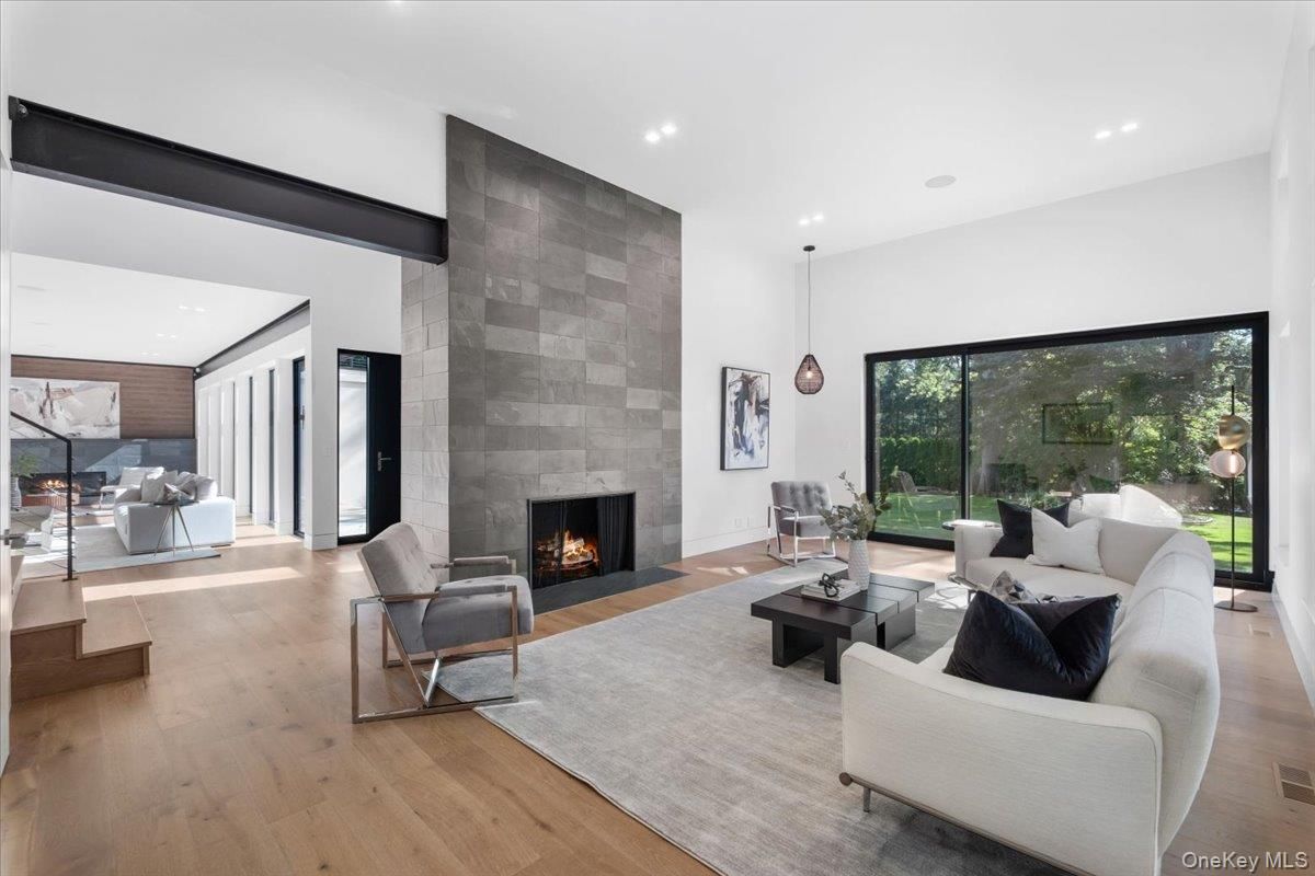 Fireplace, Interior, Living room, Pendant Lights, Recessed Lighting, Stone Walls, Wood Texture Flooring