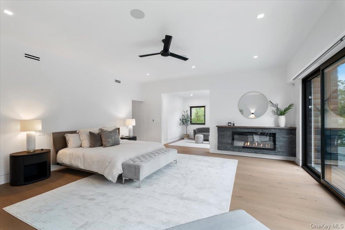 Bedroom, Fireplace, Interior, Recessed Lighting, Wood Texture Flooring