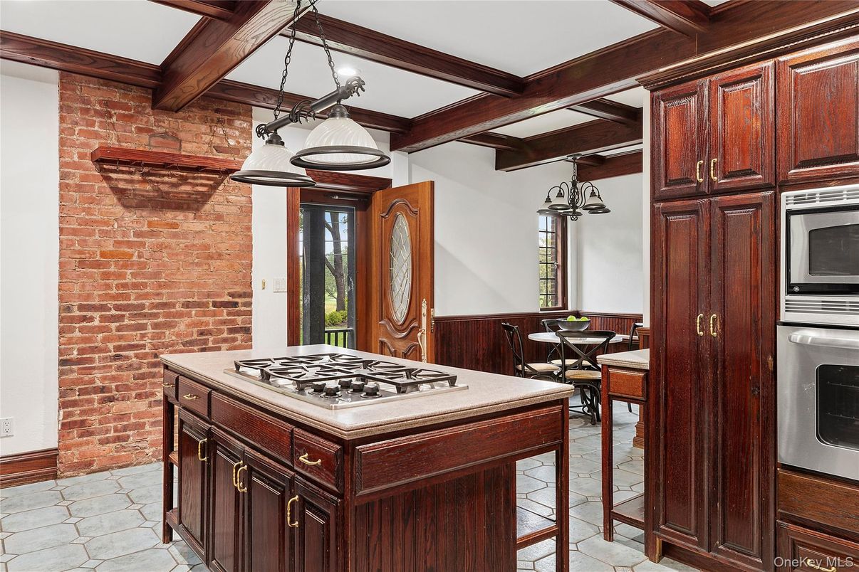 Dining room, Interior, Kitchen, Pendant Lights, Stainless Steel Appliances, Stone Walls, Wooden Beams