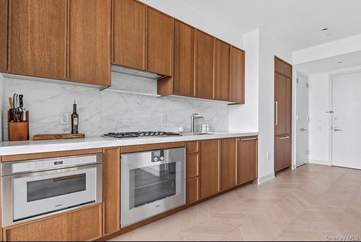 Interior, Kitchen, Marble Walls, Stainless Steel Appliances, Wood Texture Flooring
