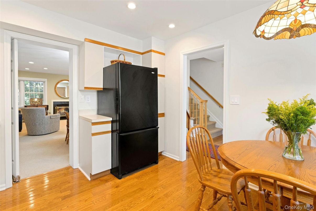 Dining room, Fireplace, Interior, Kitchen, Recessed Lighting, Wood Texture Flooring