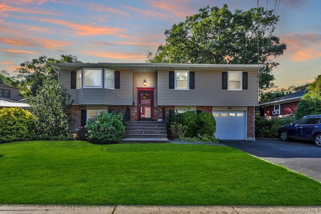 Attached, Exterior, Facade, Raised Ranch