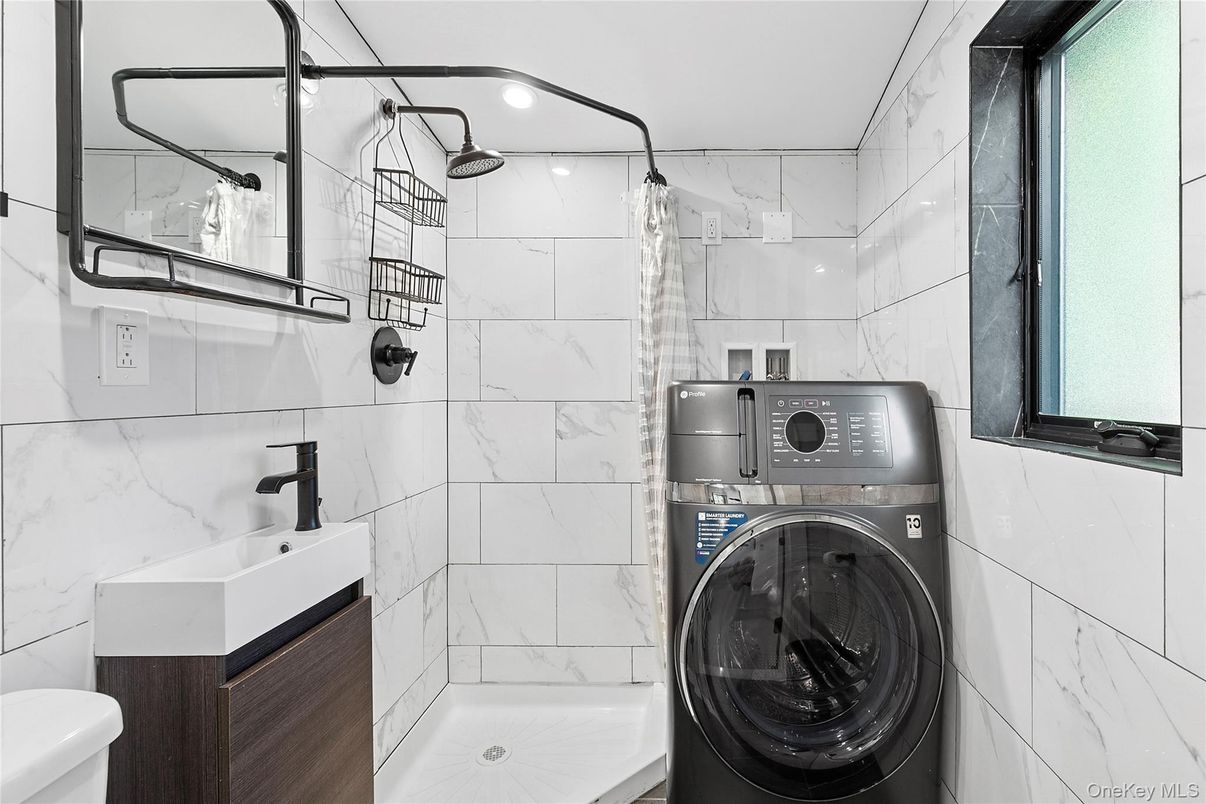 Bathroom, Interior, Marble Walls, Recessed Lighting, Utility Closets, Washer