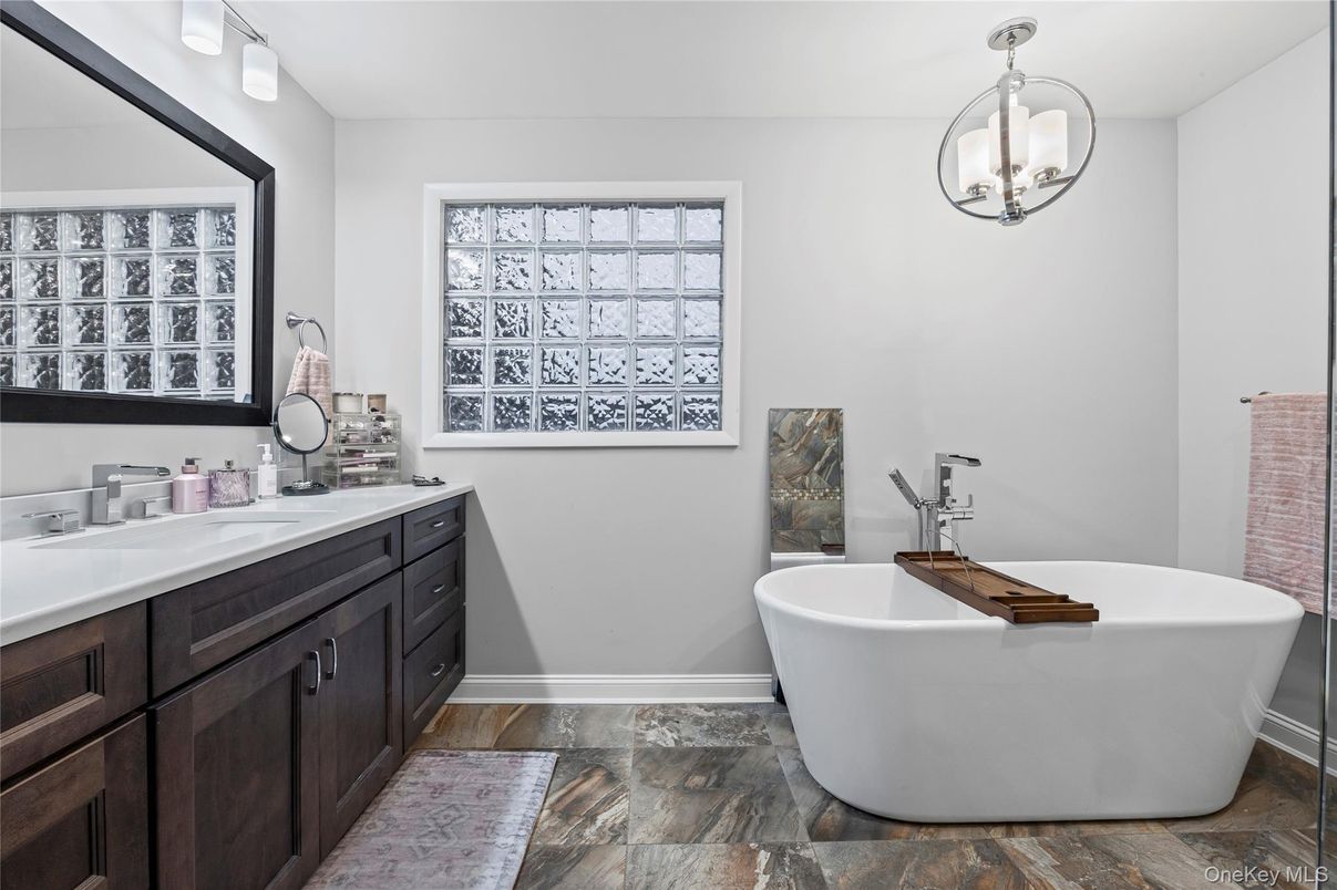 Bathroom, Dual Sink Vanities, Free Standing Baths, Interior, Pendant Lights, Wood Texture Flooring
