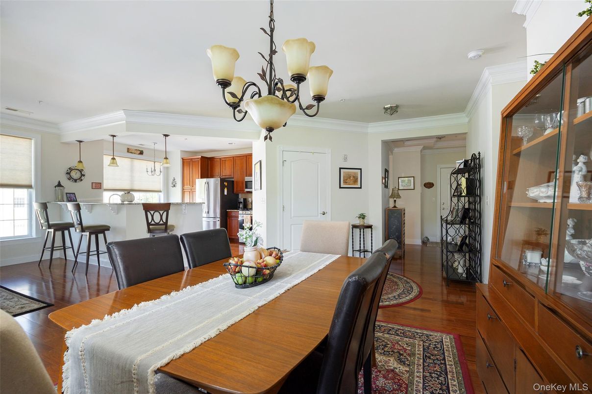 Chandelier, Dining room, Interior, Kitchen, Pendant Lights, Stainless Steel Appliances, Wood Texture Flooring