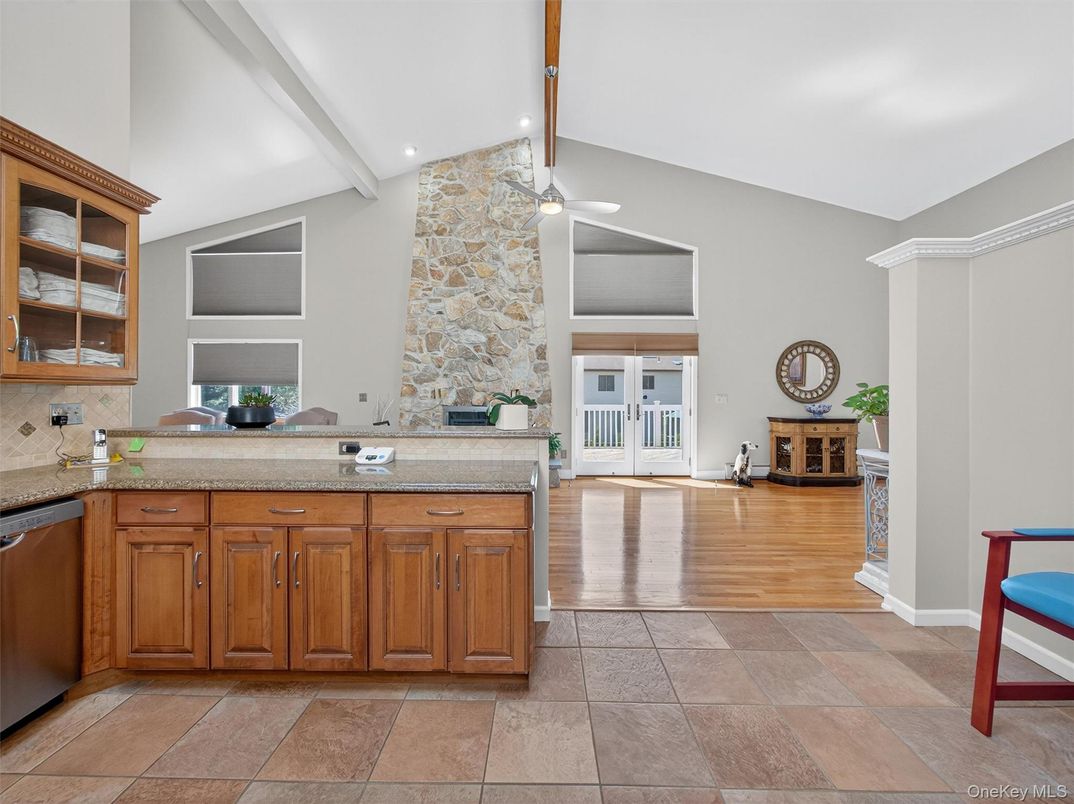 Fireplace, Interior, Kitchen, Recessed Lighting, Stone Walls, Wood Texture Flooring