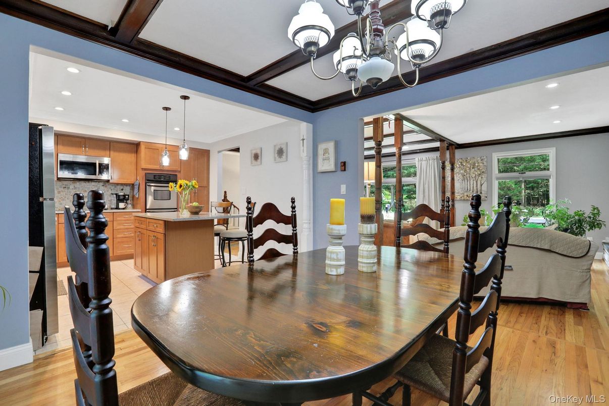 Chandelier, Dining room, Interior, Kitchen, Pendant Lights, Recessed Lighting, Stainless Steel Appliances, Wood Texture Flooring