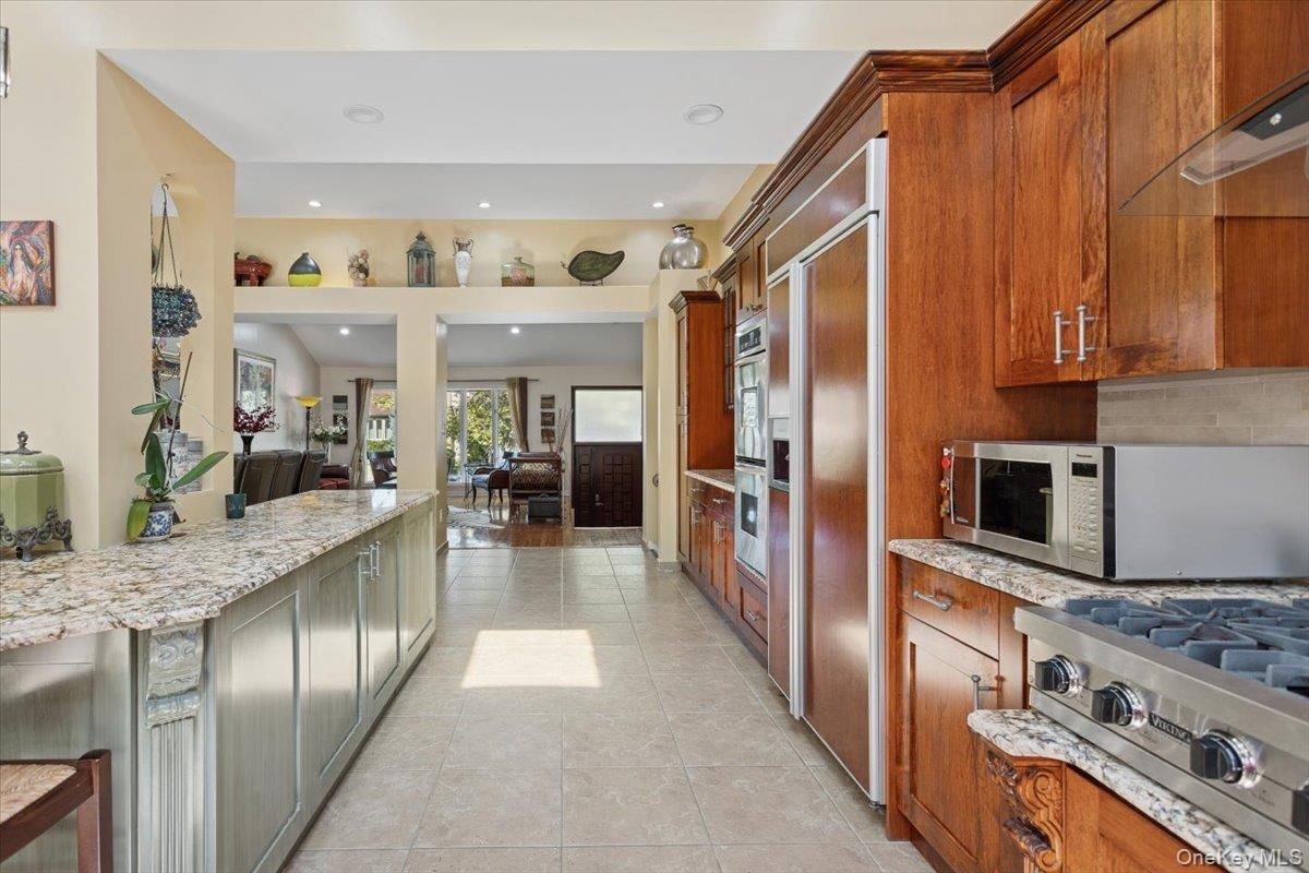 Dining room, Fireplace, Interior, Kitchen, Recessed Lighting, Stainless Steel Appliances