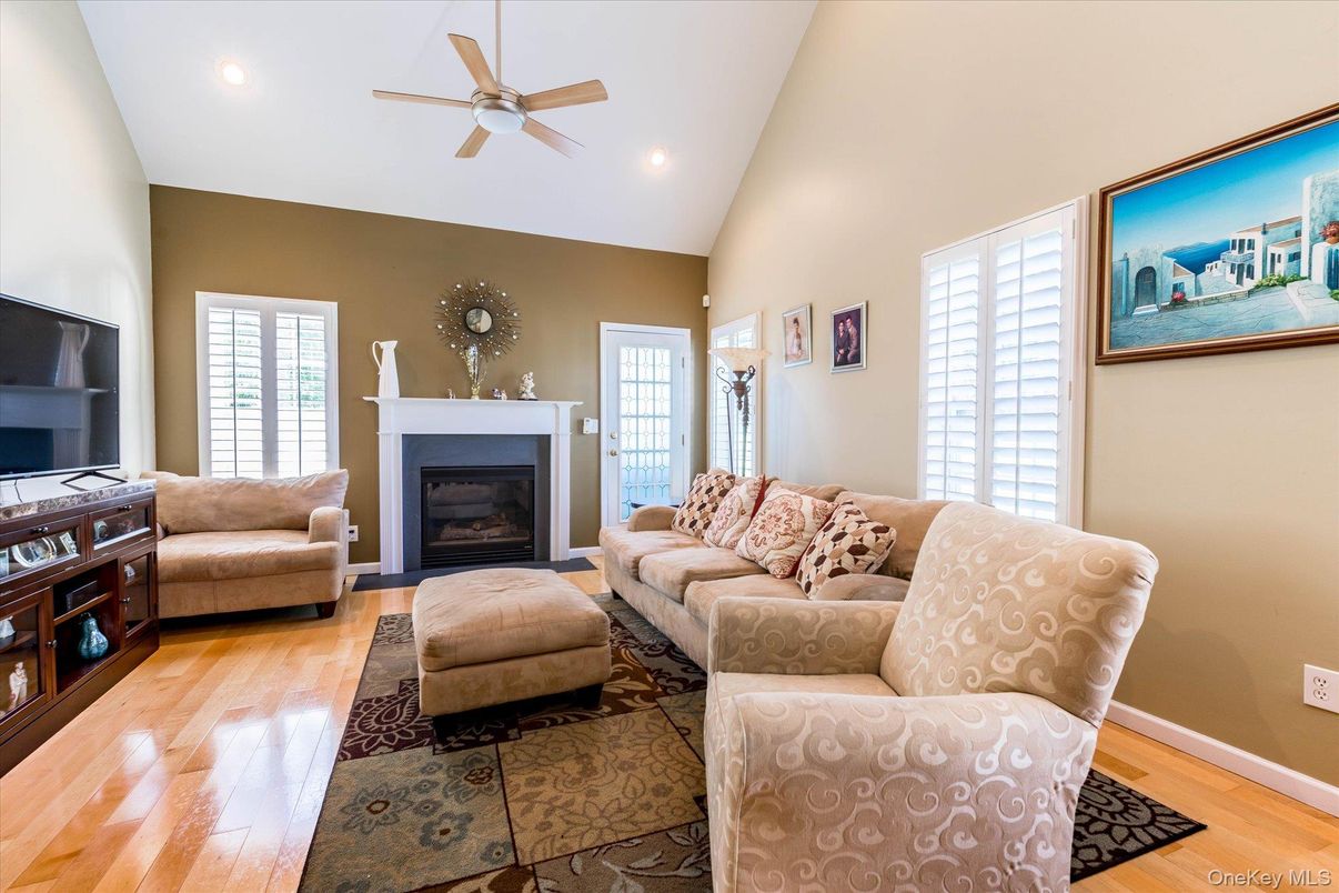 Fireplace, Interior, Living room, Recessed Lighting, Wood Texture Flooring