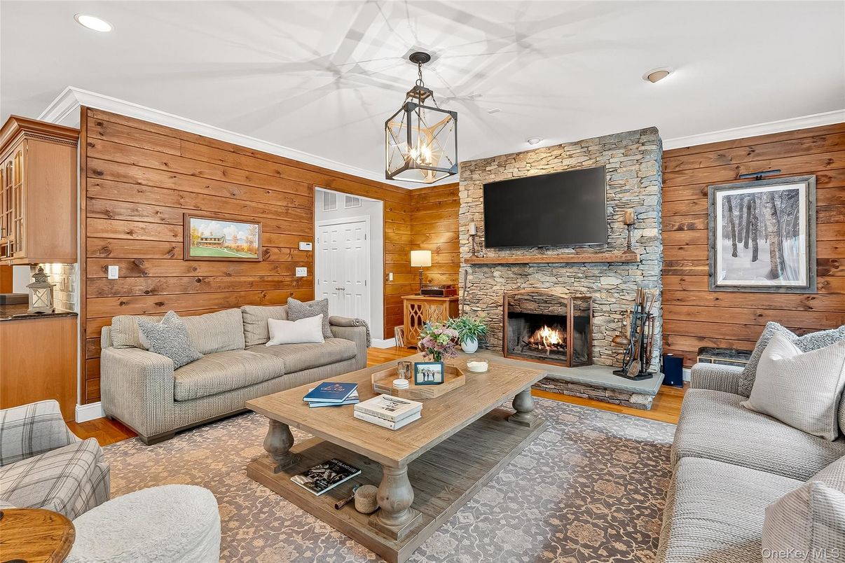 Fireplace, Interior, Living room, Pendant Lights, Recessed Lighting, Stone Walls, Wooden Walls