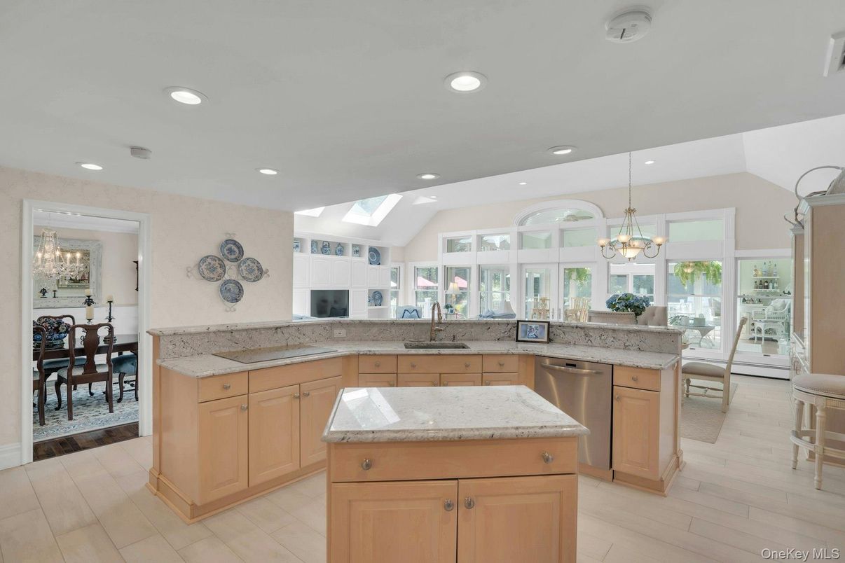 Chandelier, Dining room, Interior, Kitchen, Pendant Lights, Recessed Lighting, Stainless Steel Appliances, Wood Texture Flooring